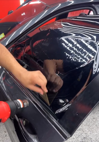 Window tint installation - Orlando Auto Detailing